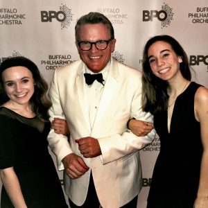 Lancaster students with JMR at Oscars concert High school student members with Principal Pops Conductor John Morris Russell